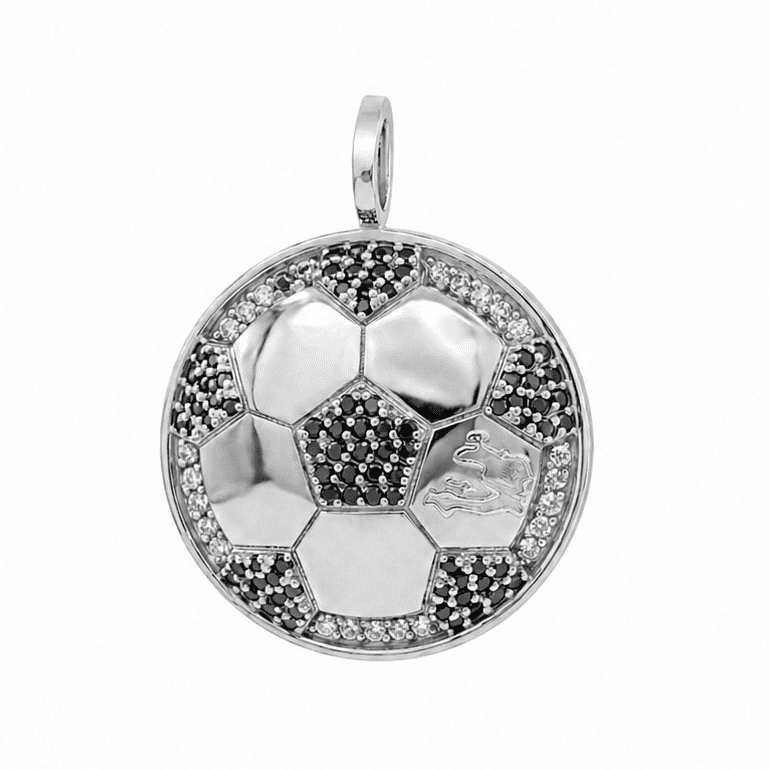Silver pendant shaped like a soccer ball with black and white stones on a white background